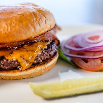 The Hungry Toad - a burger and pickle on a plate - British Near Me - Boulder, Colorado The Hungry Toad - a burger and pickle on a plate - British Near Me - Boulder, Colorado
