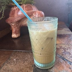Iced latte with oat milk and coconut flavoring. How cute is that turtle!!!