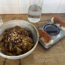 House Made Belt Noodles With Meat (Pork belly sauce)  And Roasted Chicken Spring Rolls  Warning: Very spicy