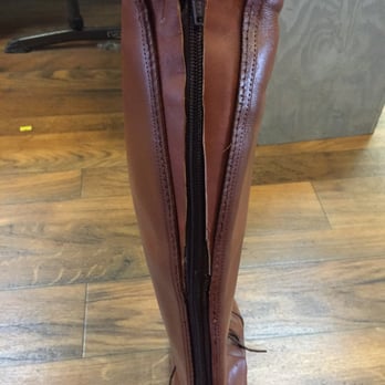 The Cobblers - Zipper installed. Messy leather gussets and careless stitching by The Cobblers - Shoe Stores Near Me - Hayward, California The Cobblers - Zipper installed. Messy leather gussets and careless stitching by The Cobblers - Shoe Stores Near Me - Hayward, California