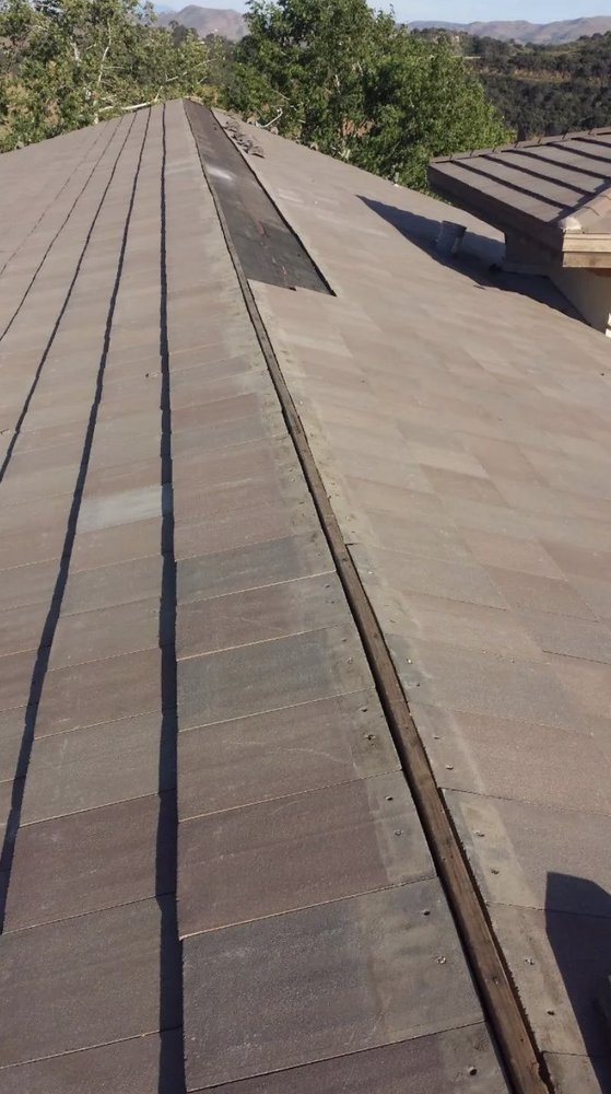 Slide of Romero's Roofing