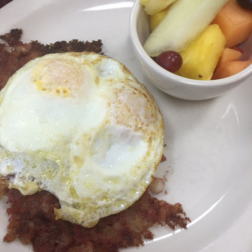 Eggs N Things - Homestyle corned beef hash, eggs over easy, side of fruit.  Came with toast (not pictured) - Breakfast & Brunch Near Me - Simi Valley, California