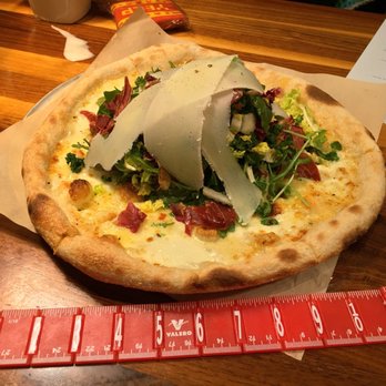 Northstar Cafe - The Fornio pizza with greens and prosciutto is a 12"  6 slice delight.  #UpCloseSavor XP - New American Near Me - Westerville, Ohio