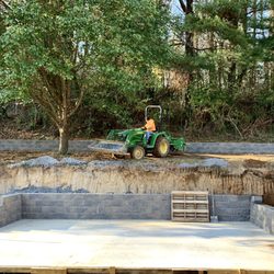 Darling Hardscapes and Design - Multiple retaining walls and a concrete patio in progress