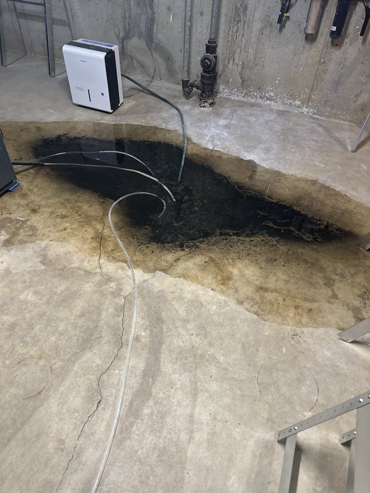 Slide of ED's Drain Cleaning