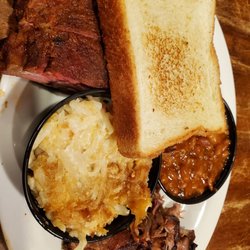 Rick's Smokehouse & Grill - Ribs and brisket with hashbrown casserole and beans
