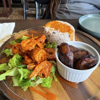 Rootz Bar N Cafe - Bang bang shrimp paired with fried plantains and rice and peas - Caribbean Near Me - Tamarac, Florida