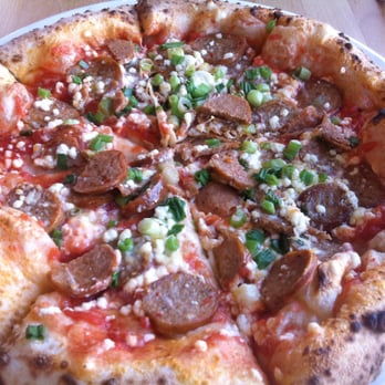 Christies Il Secondo - Italian Sausage, Green Onions, Goat Cheese and tomato sauce (Neapolitan, wood fired) - Bakeries Near Me - Saskatoon, Saskatchewan Christies Il Secondo - Italian Sausage, Green Onions, Goat Cheese and tomato sauce (Neapolitan, wood fired) - Bakeries Near Me - Saskatoon, Saskatchewan