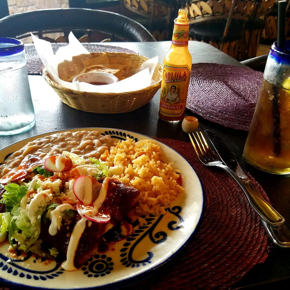 Roasted Chiles - Enchilada Pollo - 2 corn tortillas served with rice & beans, topped with sour cream, lettuce, queso fresco & red radish. - Mexican Near Me - Kihei, Hawaii Roasted Chiles - Enchilada Pollo - 2 corn tortillas served with rice & beans, topped with sour cream, lettuce, queso fresco & red radish. - Mexican Near Me - Kihei, Hawaii