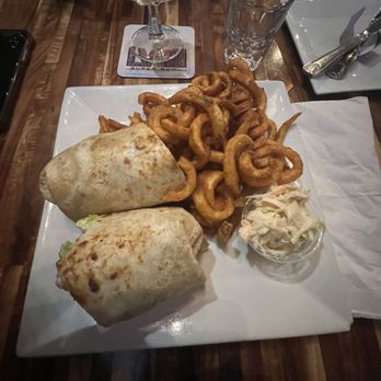 The Whistlin' Donkey - Buffalo chicken wrap with curly Fries. - Irish Pub Near Me - Yonkers, New York The Whistlin' Donkey - Buffalo chicken wrap with curly Fries. - Irish Pub Near Me - Yonkers, New York
