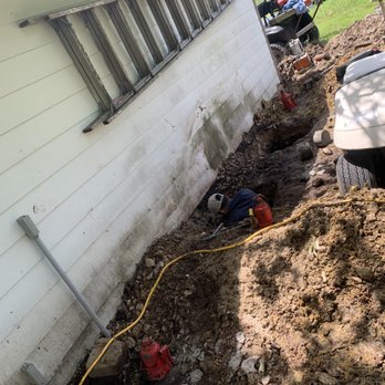 Apex Foundation Repair - Leveling garage concrete slab with storage room attachment - Foundation Repair Near Me Apex Foundation Repair - Leveling garage concrete slab with storage room attachment - Foundation Repair Near Me