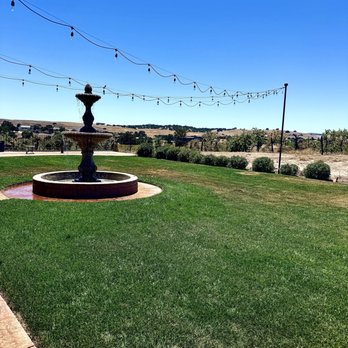 Crazy Woman Cellars - Back lawn with fountain separating the tasting room from the vineyard. - Wine Tasting Room Near Me - Paso Robles, California Crazy Woman Cellars - Back lawn with fountain separating the tasting room from the vineyard. - Wine Tasting Room Near Me - Paso Robles, California