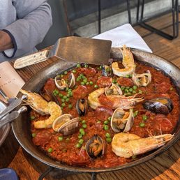 paella Montana... 30-40 minutes for preparation but so worth it!! Mussels, clams, head on shrimp and chorizo paella Montana... 30-40 minutes for preparation but so worth it!! Mussels, clams, head on shrimp and chorizo