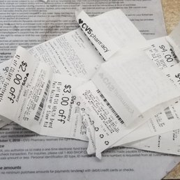 a pile of receipts on a table a pile of receipts on a table