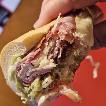 Jimmy John's - Close-up of me holding the Italian Night Club Sub while eating it - Sandwiches Near Me - Roanoke, Virginia