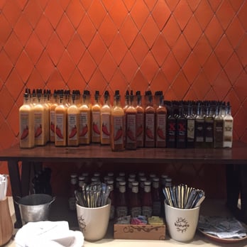 Nando's Peri-Peri - Extra sauces and condiments. My favorite is the garlic! - Chicken Shop Near Me - Chicago, Illinois Nando's Peri-Peri - Extra sauces and condiments. My favorite is the garlic! - Chicken Shop Near Me - Chicago, Illinois