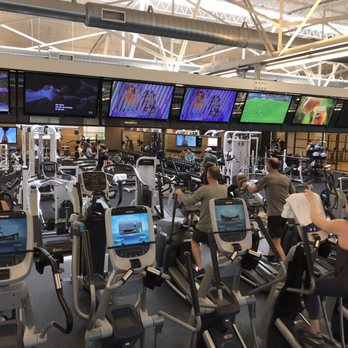 Equinox Summit - Full rows of cardio machines along the wall facing the weights and TVs - Gyms Near Me - Summit, New Jersey Equinox Summit - Full rows of cardio machines along the wall facing the weights and TVs - Gyms Near Me - Summit, New Jersey