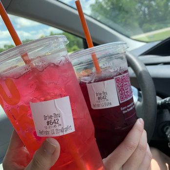 Dunkin' -  two drinks in plastic cups with orange straws - Coffee & Tea Near Me - Dothan, Alabama
