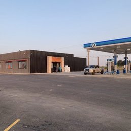 The front of the gas station. The front of the gas station.