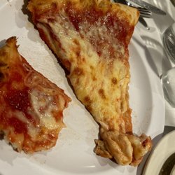 Giuseppe's - Soggy and over packed with cheese pizza