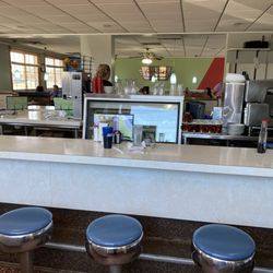 Achilles Restaurant - Counter area - Achilles sign on far mirrored wall