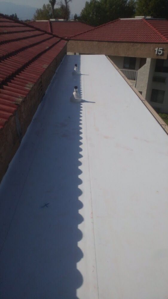 Slide of E & E Roofing