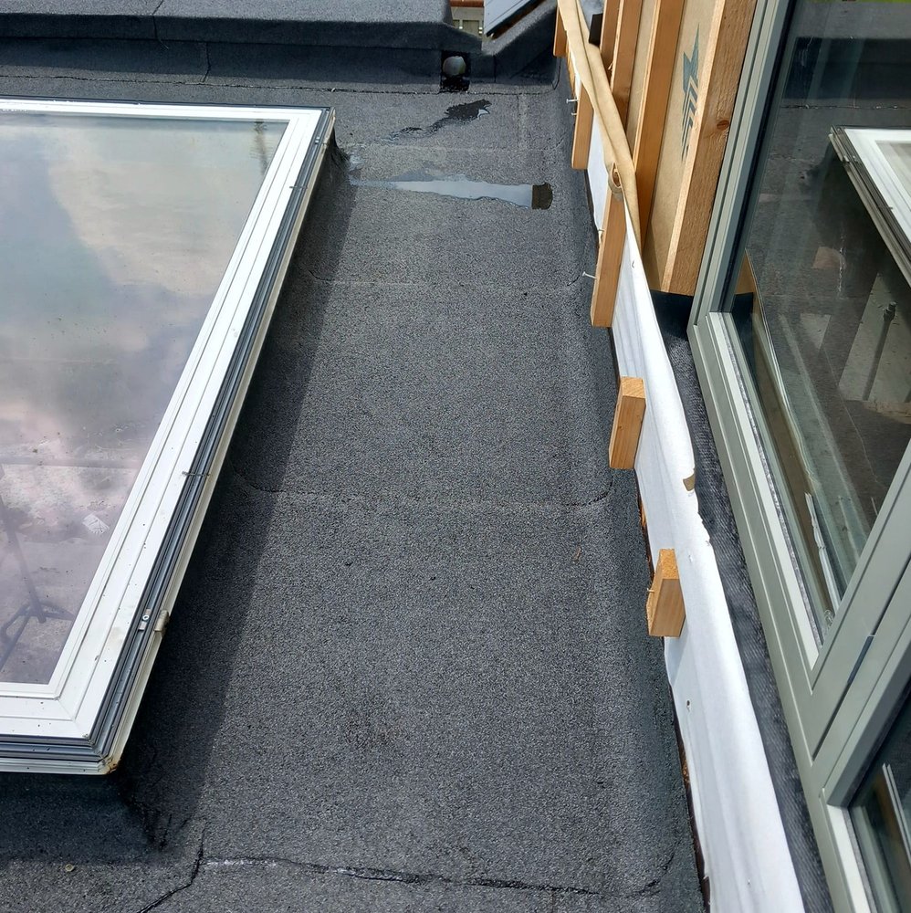 Slide of Pecan Park Roofing