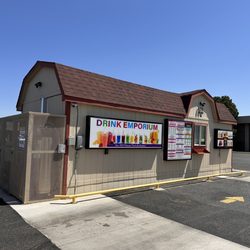 Drink Emporium - Drink Emporium. There is a drive-thru on either side. 1/17/2024