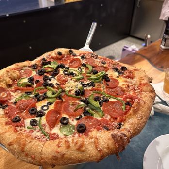 Mellow Mushroom Ocala - Pepperoni, green peppers, and olives, the crust was amazing! - Pizza Near Me - Ocala, Florida