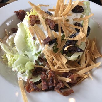 The Leaning Pear - Iceberg Wedge-dried figs, tortilla strips, buttermilk blue cheese dressing - Sandwiches Near Me - Wimberley, Texas The Leaning Pear - Iceberg Wedge-dried figs, tortilla strips, buttermilk blue cheese dressing - Sandwiches Near Me - Wimberley, Texas