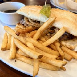 The Bistro: Prime Rib Sandwich with mozzarella, crispy onion shreds, chipotle mayo and a side of au jus