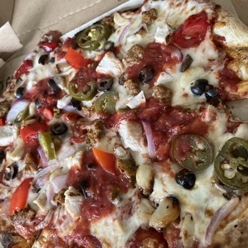 MOD Pizza - Mod size with Jalapeños, roasted garlic, onions,black olives, red peppers, spicy chicken sausage, double chicken, and extra red sauce! - Fast Food Near Me - Colorado Springs, Colorado