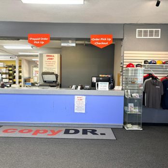 Copy Doctor - Inside store front counter with brander carpet at floor - Printing Services Near Me - Friendswood, Texas Copy Doctor - Inside store front counter with brander carpet at floor - Printing Services Near Me - Friendswood, Texas