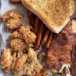Dinner player with shrimp  Oyster  and fish  all fried with sweet potatoes, toast and coleslaw