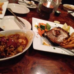 Cedar plank grilled Grouper (overlooked) and the walnut sauce spilled on my mother.