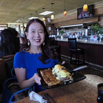 My Cafe - President and CEO Lily Mei of the Newark Chamber of Commerce with her Steakloin Benedict - Breakfast & Brunch Near Me - Newark, California My Cafe - President and CEO Lily Mei of the Newark Chamber of Commerce with her Steakloin Benedict - Breakfast & Brunch Near Me - Newark, California