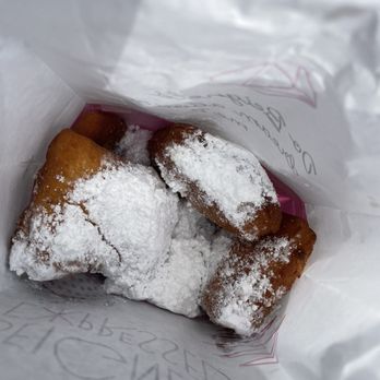 Beignets Expressed - Fresh out of the fryer and dusted with powdered sugar - Desserts Near Me - Anaheim, California Beignets Expressed - Fresh out of the fryer and dusted with powdered sugar - Desserts Near Me - Anaheim, California