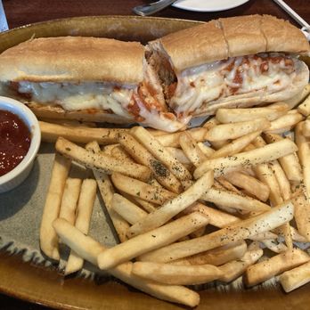 Toni's Italian Restaurant - Meatball sandwich with fries - Italian Near Me - Shawnee, Kansas Toni's Italian Restaurant - Meatball sandwich with fries - Italian Near Me - Shawnee, Kansas