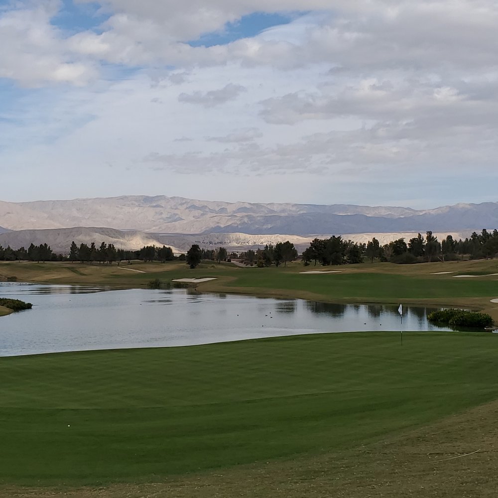 View looking back from 18 green towards the tee box. View looking back from 18 green towards the tee box.
