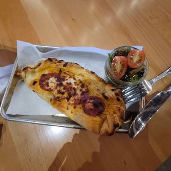 Guildhouse - Calzone pepperoni is fire with a sidd salad - Bars Near Me - San Jose, California Guildhouse - Calzone pepperoni is fire with a sidd salad - Bars Near Me - San Jose, California