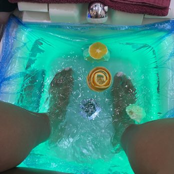 Inspire Nail Bar - Feet up next.  Yes those are fresh oranges and orange oil.  A decadent pedicure for sure! - Nail Salons Near Me - Chantilly, Virginia