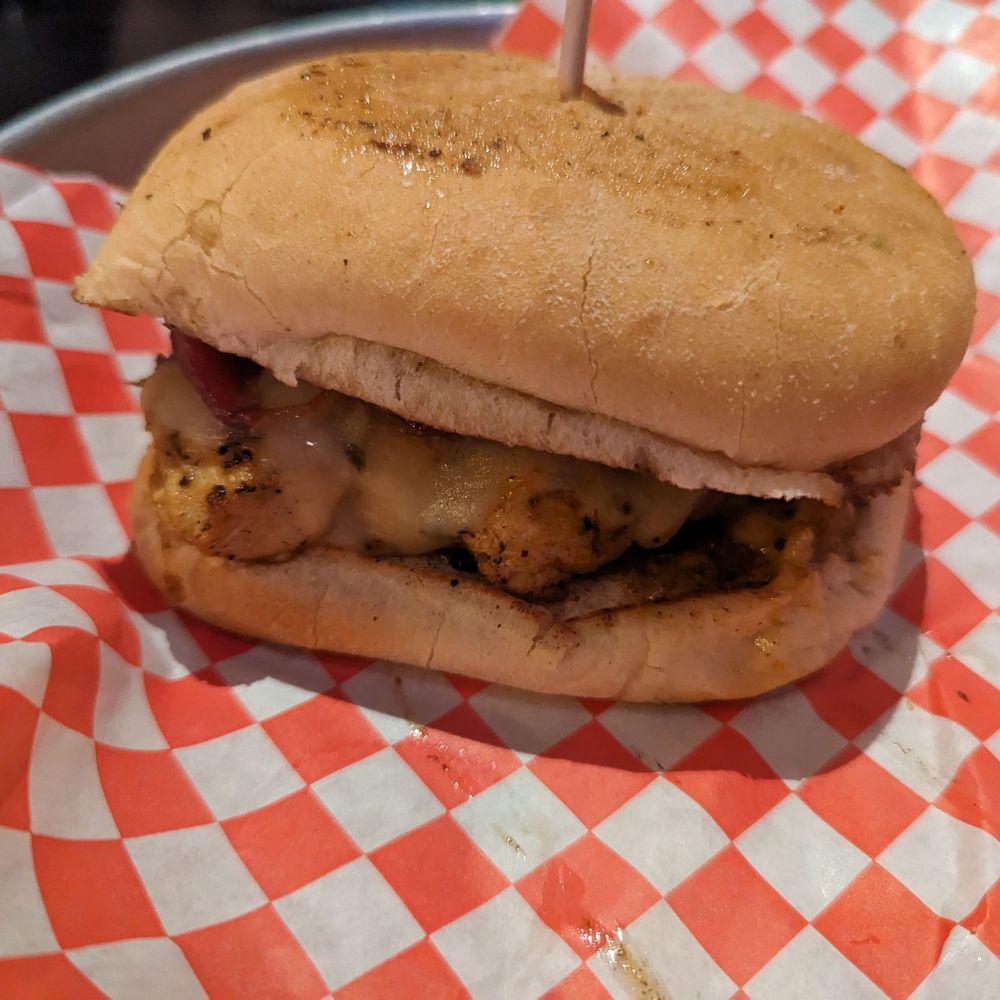 2 Javelinas Draft House - Cajun chicken sandwich, no pico de gallo (tastes WAY better than this picture represents) - Bars Near Me - Pecos, Texas