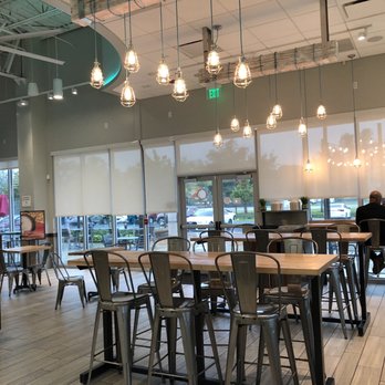 Bolay - a restaurant with tables and chairs - New American Near Me - Coral Springs, Florida Bolay - a restaurant with tables and chairs - New American Near Me - Coral Springs, Florida