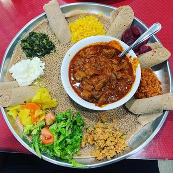Addis Restaurant - Mahbarawi platter with beef and all the vegetables. I asked them to add the cheese, which was awesome. - Ethiopian Near Me - Columbus, Ohio Addis Restaurant - Mahbarawi platter with beef and all the vegetables. I asked them to add the cheese, which was awesome. - Ethiopian Near Me - Columbus, Ohio