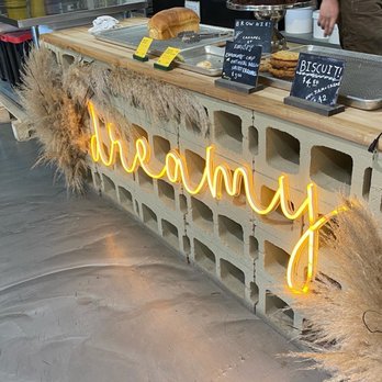Dreamy - a display of food at a farmers market - Bakeries Near Me - Montreal, Quebec