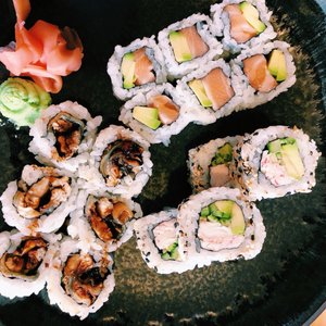 Photo of Yami Sushi Bistro - Prague, Czech Republic. BBQ eel, salmon avocado, and California rolls