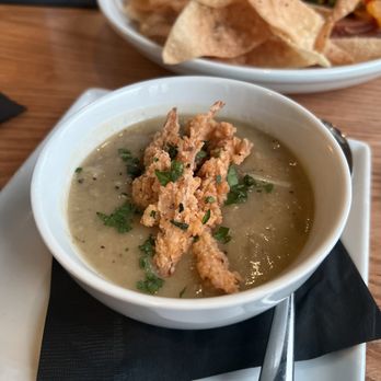 Roots Seasonal Cuisine - Potato scallion soup cup - New American Near Me - Lee's Summit, Missouri