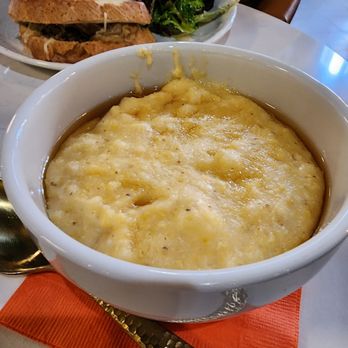Ritual House - Cheddar cheese grits with hot honey drizzle - Breakfast & Brunch Near Me - Pittsburgh, Pennsylvania Ritual House - Cheddar cheese grits with hot honey drizzle - Breakfast & Brunch Near Me - Pittsburgh, Pennsylvania