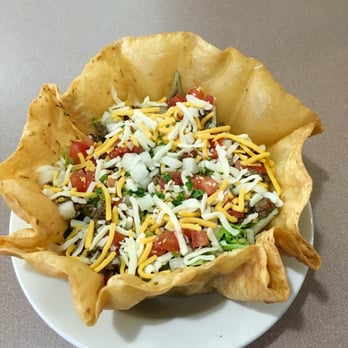 Paco's Tacos - Paco salad launch lettuce onions tomatoes cheese choice of meat so cream on top - Mexican Near Me - Madison, Wisconsin