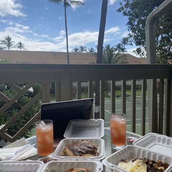 808 Grindz Cafe - florentine salmon with poached eggs, full stack of hazelnut nutella pancakes, steak with eggs togo on our lanai - Cafes Near Me - Lahaina, Hawaii